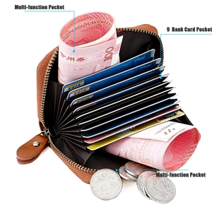 Detail view of leather wallet interior with nine card slots and two large compartments
