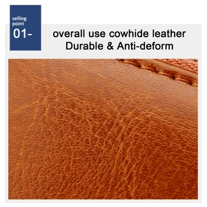 Close-up of brown cowhide leather card holder with visible grain and durable stitching