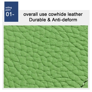 Macro detail of green cowhide leather with lychee texture and anti-deform features
