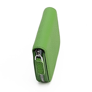 Detail of green litchi grain leather purse featuring secure silver metal zipper closure