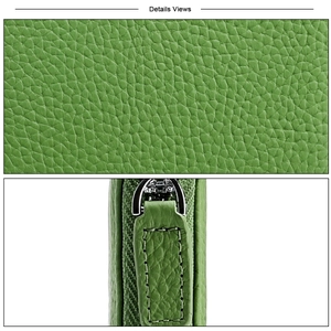 Detail view of green pebbled leather wallet showing premium texture and silver zipper