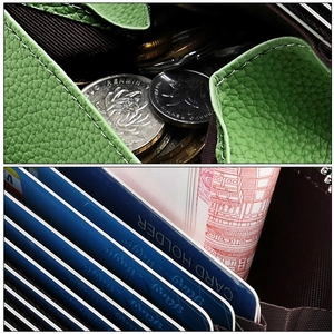 Close-up of green pebble leather wallet showing multi-card slots and zippered coin pouch