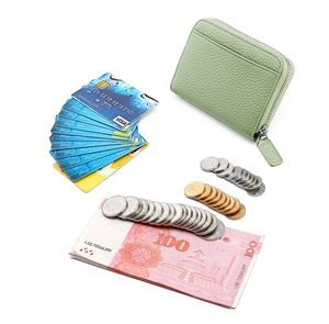 Detail of light green leather accordion card wallet with RFID protection and large capacity
