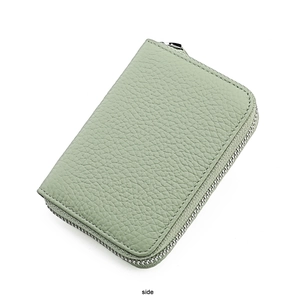 Side view of bean green litchi grain leather card holder with silver zipper details