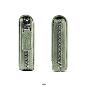 Detail view of the mint green pebble leather coin purse with silver metal zipper closure