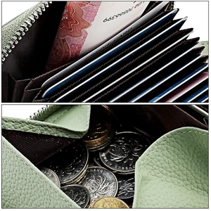 Detail of light green litchi grain leather card holder with concertina slots and coin pocket