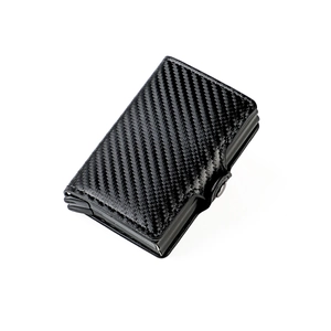 Detail view of RFID-blocking carbon fiber wallet featuring modern metallic frame