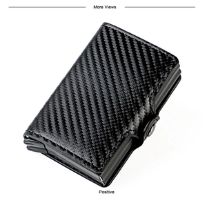 Close-up of black carbon fiber RFID card wallet with metal frame and secure snap closure