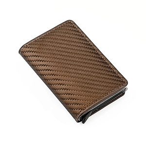 Detailed close-up of brown carbon fiber texture and stitching on an automatic card holder