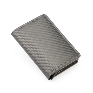 Detail view of carbon fiber texture and stitching on business metal card holder