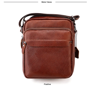 Vue détaillée du sac bandoulière en cuir grainé marron avec fermetures éclair de qualité