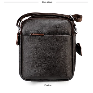 Front view of coffee brown leather crossbody bag with lychee texture and adjustable strap