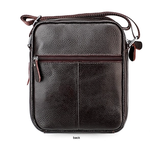 Detail view of the back of a brown leather messenger bag with zipper and stitch detail