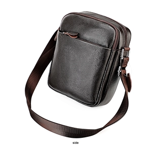 Side view of men's dark brown leather crossbody bag with lychee grain texture