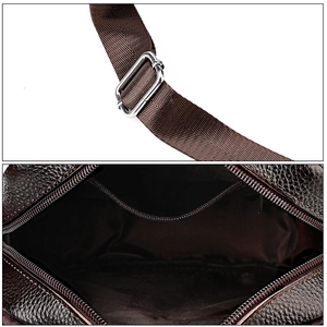 Detail of adjustable nylon shoulder strap and internal zipper pocket of the brown leather bag