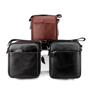 Three premium pebbled leather crossbody bags for men in brown and black on white background