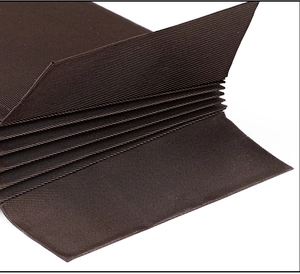 Detailed close-up of dark brown accordion card holder interior with multi-slot fabric