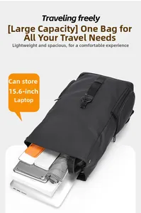 Detail view of black backpack interior fitting a 15.6-inch laptop and essentials