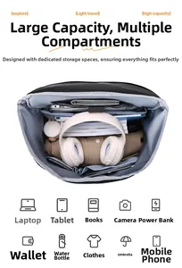 Detailed interior view of a high-capacity black backpack with organized laptop compartments
