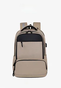 Front view of beige business backpack with double zipper compartments and side pocket