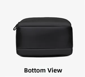 Detailed bottom view of black business backpack showing durable water-resistant fabric