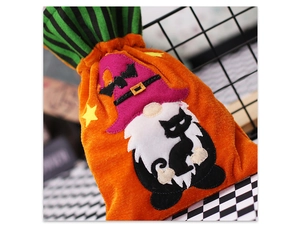 Detail of velvet Halloween gnome drawstring bag with embroidery and witch hat design