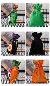 Detail of Halloween drawstring gift bags in velvet with festive cartoon embroidery