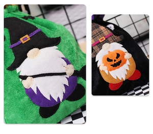 Detail of Halloween gnome drawstring gift bags with velvet applique and festive embroidery