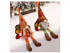 Detail showing two Thanksgiving turkey gnomes with maple leaf wings and long plaid legs
