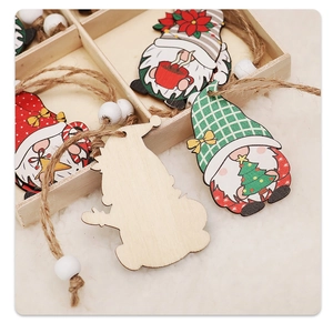 Detail of wooden Christmas gnome pendants with rustic jute strings and decorative beads