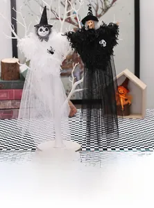 Halloween hanging ghosts with tulle skirts and pointed hats for party venue decoration