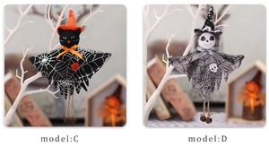 Detail of Halloween ghost dolls with pumpkin and skull charms on tree branches