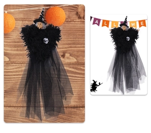 Detail of Halloween witch hanging decor with black gauze skirt and white skull accent
