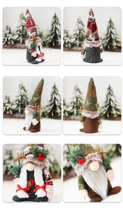 Close-up of Christmas gnomes with knitted hats, white beards, and wooden ski poles decor
