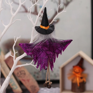 Halloween witch hanging ornament with purple spider web cloak and copper bells