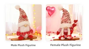 Close-up of Valentine's gnomes with sequin hats and LOVE heart in a romantic setting