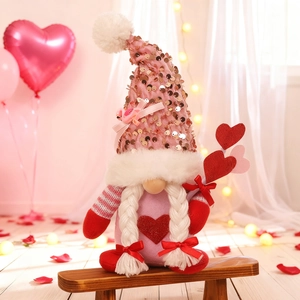Pink sequin Valentine's Day gnome doll with white braids and heart decoration