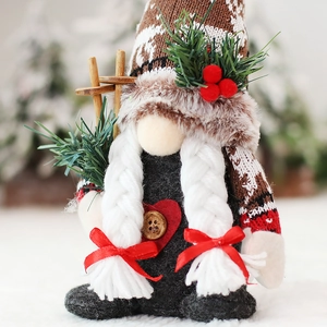 Girl Christmas gnome plush with reindeer knit hat and wooden skis holiday decoration