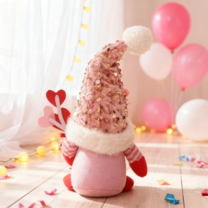 Close-up of pink Valentine's gnome with sequined hat and heart ornament on wooden floor