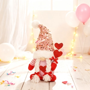 Pink sequin gnome plush with white braids and heart detail for Valentine decoration