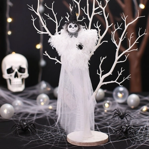 Halloween white ghost doll with witch hat and tulle dress hanging on a spooky tree decor