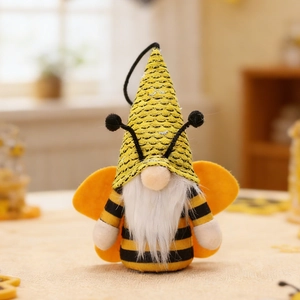 Detailaufnahme eines Bienen-Zwergs mit gelben Streifen, weißem Bart und Filzflügeln