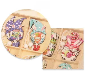 Detail view of colorful Easter wooden gnome ornaments with Happy Easter text and beads