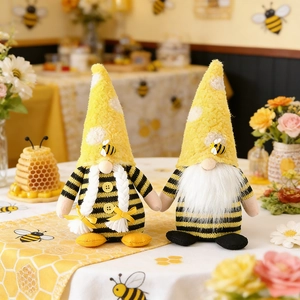 Set of two honey bee gnomes with yellow polka dot hats for spring home decoration