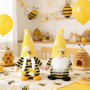 Handmade bee festival gnomes set with striped bodies and yellow knitted hats for decor