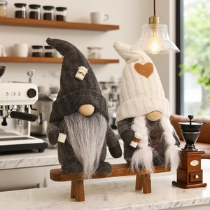 Charming coffee gnome plush set with knit hats and miniature coffee cups on wood bench