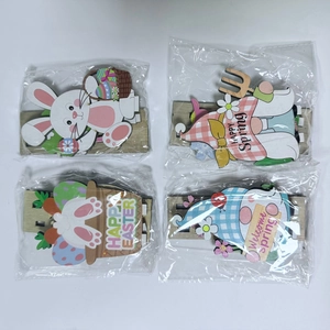 Detail of DIY wooden Easter bunny and gnome ornaments in four-piece decorative set