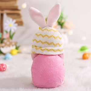 Close-up of Easter gnome with bunny ears on a cozy festive decorative background