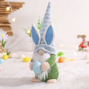 Detailed view of Easter gnome plush with bunny ears holding a striped egg on white fur