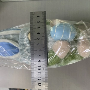 Easter gnome plush doll size measurement showing approximately 13cm length with ruler